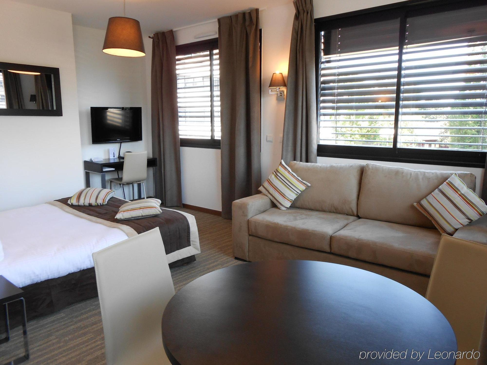 Zenitude Swiss Apparthotels Ферне-Вольтер Номер фото